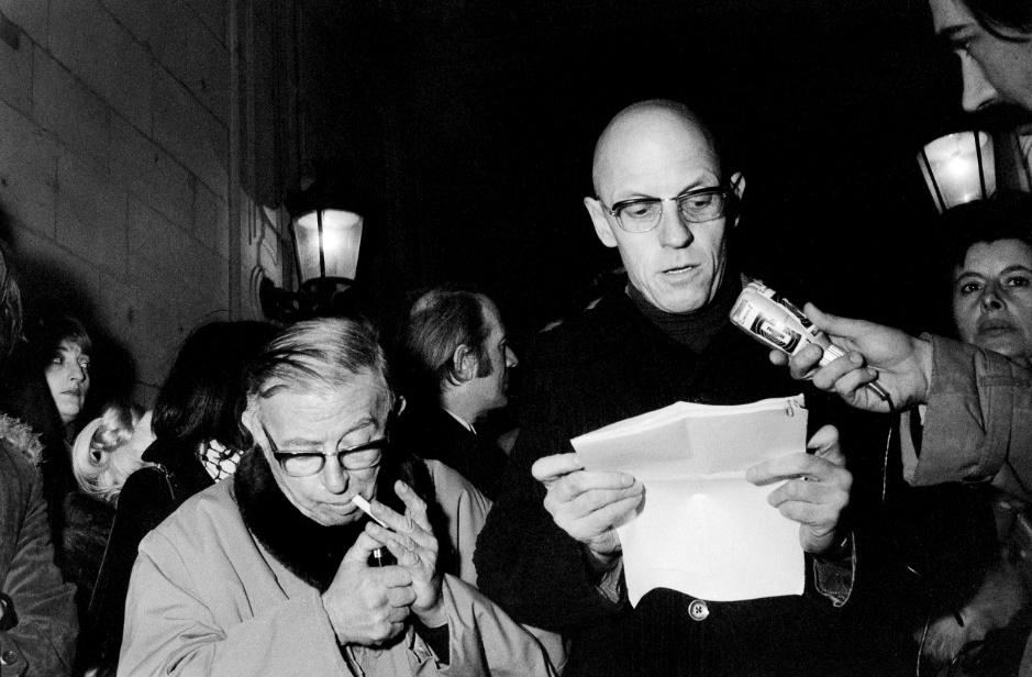 French leftists at a demonstration at the Ministry of Justice, fighting for the rights of immigrants: Jean-Paul Sartre and Michel Foucault, 1972.